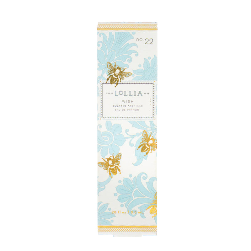 A tall, rectangular bottle of Margot Elena Lollia Wish Travel Eau de Parfum, featuring an elegant floral pattern in light blue and gold on a white background.