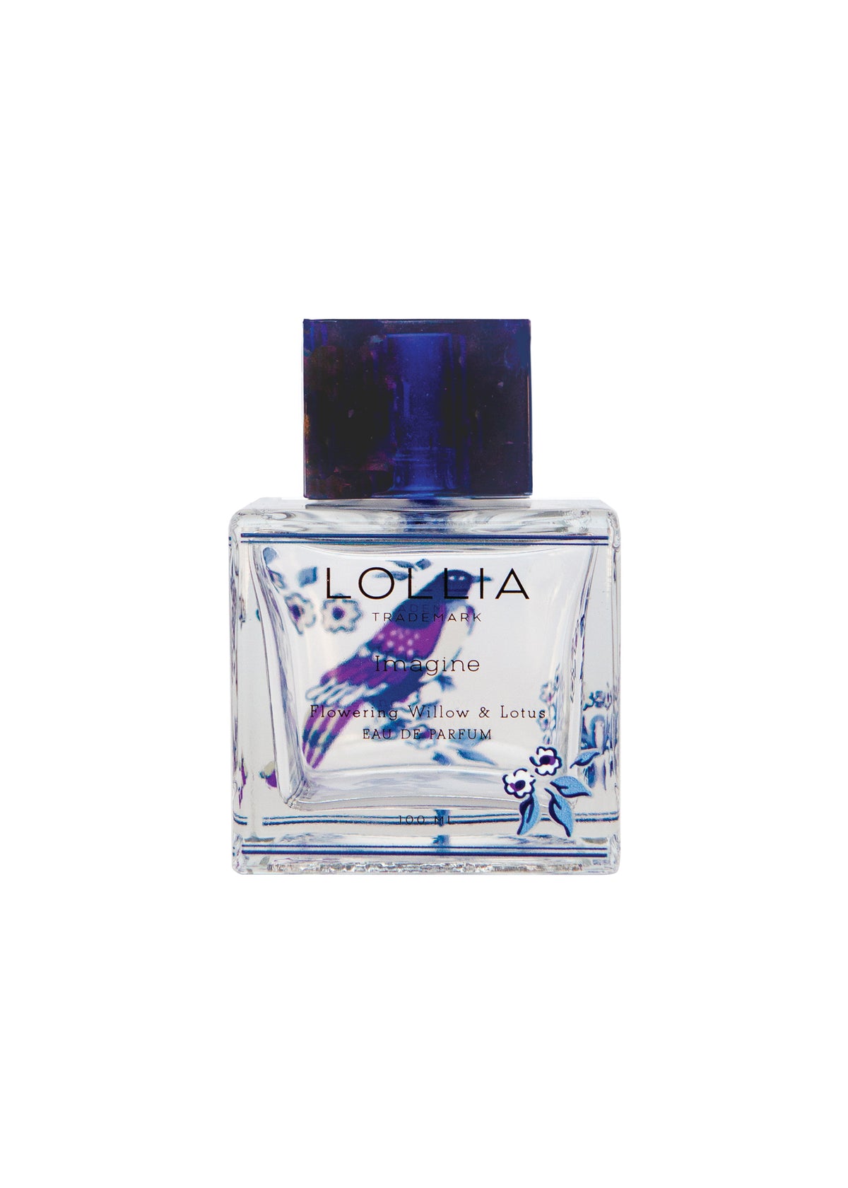 A rectangular clear glass perfume bottle with a blue cap, featuring "Lollia Imagine" by Margot Elena and blue floral designs. The scent is Marshmallow & Lotus with Jasmine notes. The bottle is isolated on a white background.