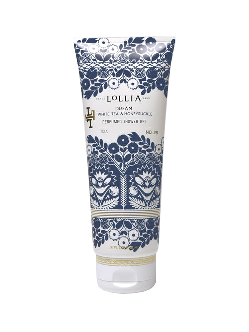 A tube of Margot Elena Lollia Dream Shower Gel with white tea and honeysuckle, in a blue and white floral patterned package with gold accents.