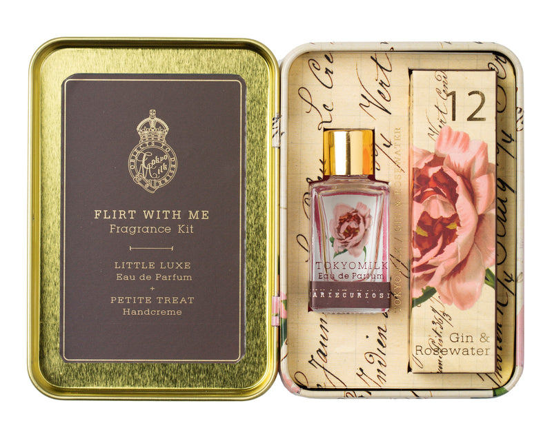 A vintage-style Margot Elena TokyoMilk Gin & Rosewater Flirt With Me fragrance kit in a gold tin, with a perfume bottle and hand cream inside, featuring elegant floral and typographic designs.