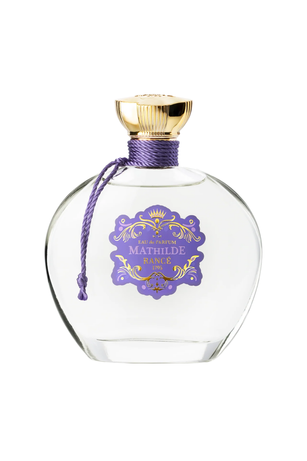 Rancé Mathilde Eau de Parfum - 100ml by Rancé comes in a clear glass bottle with a gold cap, purple cord, and ornate label, offering a refined floral woody fragrance that captures timeless elegance.