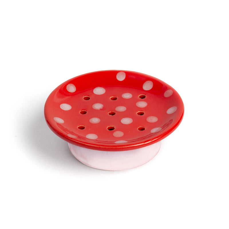 Kala’s Swedish Dream Red Mushroom Ceramic Soap Dish features a round red design with white polka dots and drainage holes on a white base, beautifully photographed against a white background.