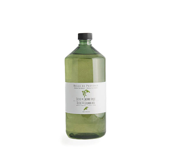 A large green-tinted plastic bottle with a black cap and white label, containing lot Belle de Provence Olive & Cucumber-Basil Liquid Soap Refill, is placed against a plain white background.