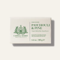 A rectangular white package labeled "Caswell-Massey Patchouly and Pine Bar Soap." This 6.4 oz plant-based, triple-milled soap is enriched with cocoa butter and olive oil.