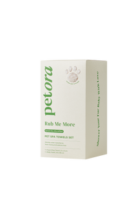 A white box labeled "Petora RUB ME MORE Pet Spa Towels Set" features green text, a paw print graphic, and highlights an ultra-absorbent microfiber pet towel for quick-drying pets. Brand: Petora.