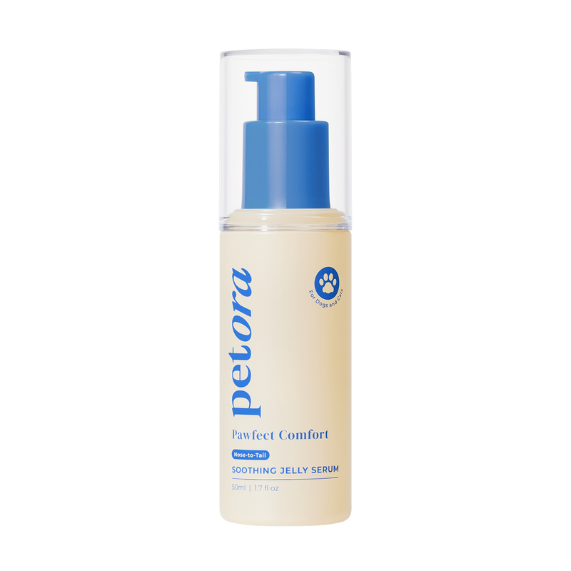 A beige bottle of Petora PAWFECT COMFORT Nose-to-Tail Soothing Jelly Serum by Petora with centella asiatica, blue pump, clear cap, blue text, and a paw print logo—ideal for soothing irritated skin.