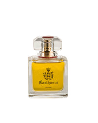 A clear glass bottle of yellow Carthusia Prima del Teatro di San Carlo Parfum by Carthusia I Profumi de Capri, featuring a square faceted cap, gold accents, and a front label with the Carthusia logo and black text.