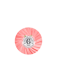A wrapped bar of Roger & Gallet Fig Blossom soap on a solid background, with the packaging displaying a vibrant red and white embossed design and the logo at the center. This luxurious soap represents Roger & Gallet.