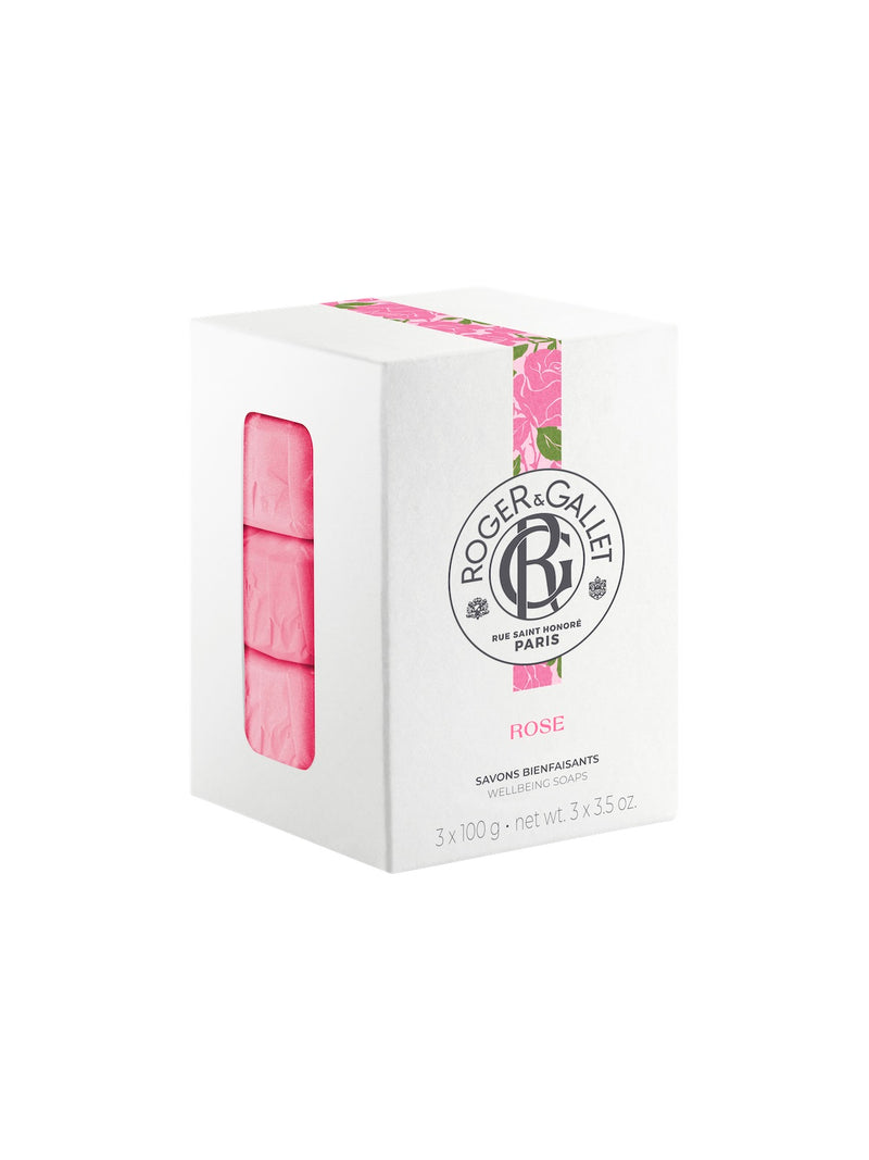 A box of Roger & Gallet Rose - Wellbeing Soaps Set with three pink bars visible through a side cutout, labeled in elegant black and pink design.