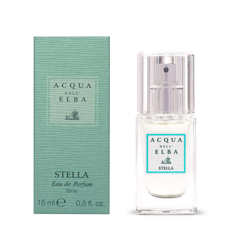The Acqua dell'Elba Stella EdP 15ml Travel Size is displayed beside its green textured box, both featuring minimalist text and the brand’s sailboat logo, reflecting the fresh Mediterranean spirit of Acqua dell'Elba.