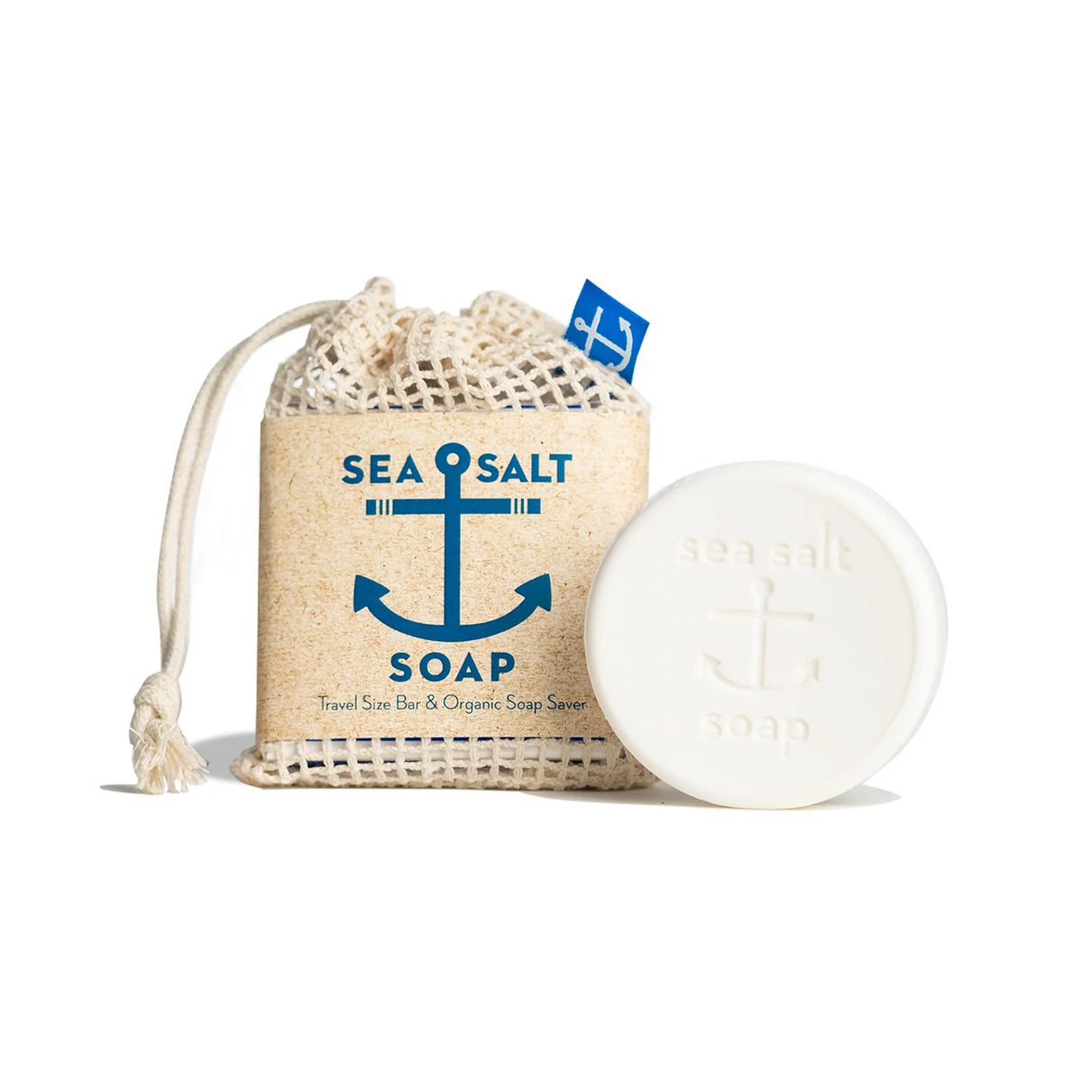 A Swedish Dream Sea Salt Travel Size Soap by Kala is placed beside the Organic Soap Saver, both showcasing a nautical theme with an anchor design. The packaging prominently features "Sea Salt Soap," making it ideal for gentle skin exfoliation.