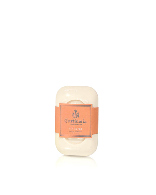 The Carthusia Terra Mia Bar Soap by Carthusia I Profumi de Capri, a rectangular white artisanal bar with rounded edges and an orange label, adds Mediterranean fragrance to your unisex skincare routine against a plain white background.