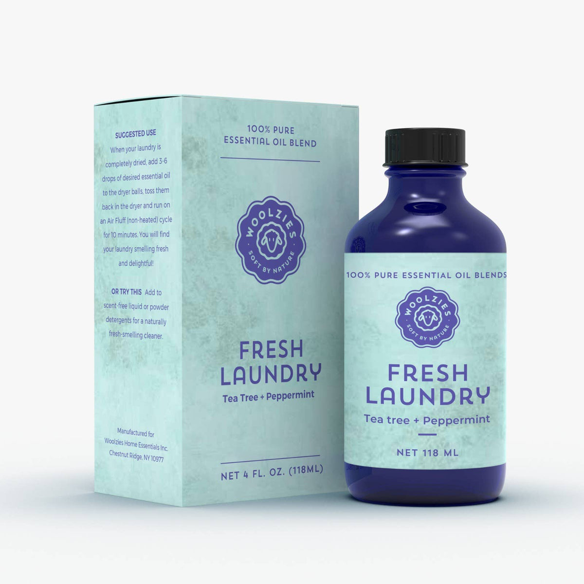 A blue bottle of Woolzies Fresh Laundry Essential Oil sits next to its matching box. This 4 fl. oz. blend by Woolzies is ideal for dryer balls, providing a long-lasting fresh scent for laundry.