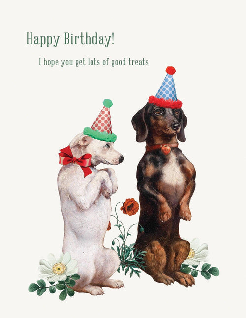 Two dogs in party hats and bows sit among flowers beneath the text, “Happy Birthday! You deserve lots of treats.” The P. Flynn Design / Phun House card adds cheer to any birthday greeting card collection.