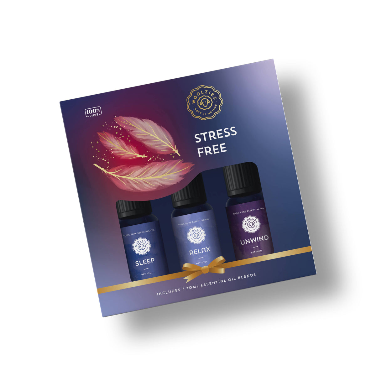 The Woolzies Stress Free Holiday Collection by Woolzies features 10ml bottles of Sleep, Relax, and Unwind lavender essential oil blends in purple feather-printed packaging with gold accents to promote relaxation.