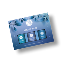 A blue box labeled "Woolzies Stress Free Collection" contains three 10ml natural relaxation oils—Unwind, Enchanting Lavender, and Sleep. Leafy graphics decorate the Woolzies packaging for a calming touch.