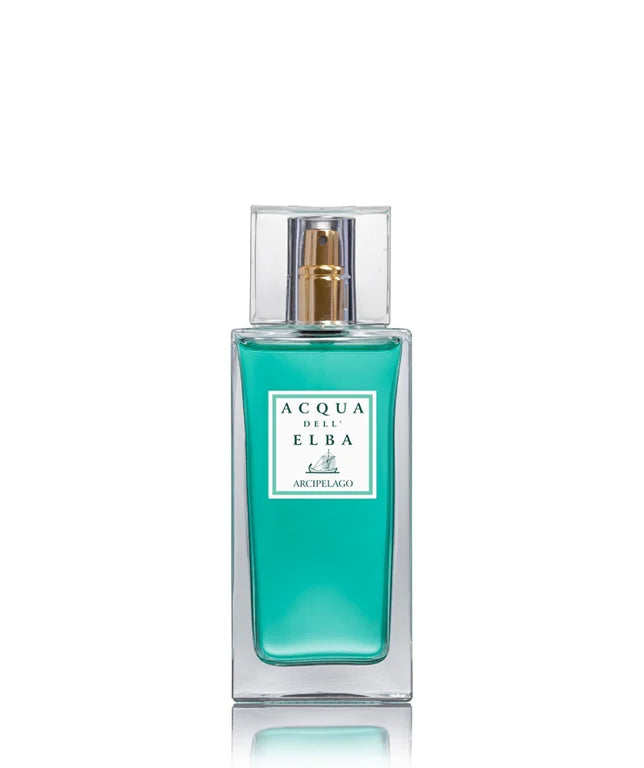 The Acqua dell'Elba Arcipelago Donna Eau de Parfum 50ml comes in a clear glass bottle filled with turquoise liquid, capturing the spirit of the Tuscan Archipelago. It is adorned with a minimalist white label featuring the Acqua dell'Elba logo and name.