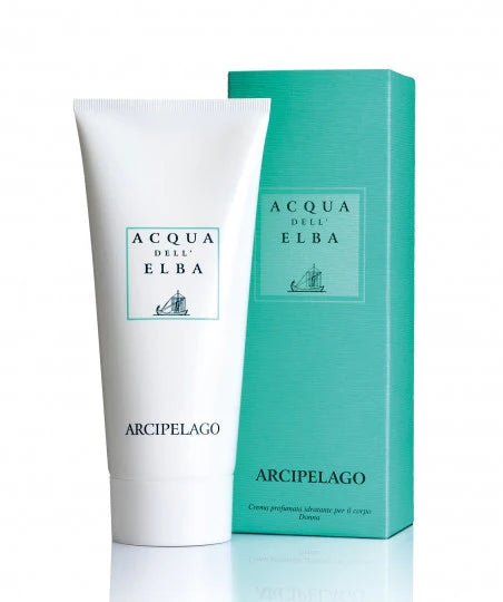 The white tube of Acqua dell'Elba Arcipelago Donna Body Lotion, essential for skincare routines, stands beside its turquoise box. Both display a minimalist sailboat logo and elegant typography. The tube is slightly forward, highlighting its clean design and signature Arcipelago scent.