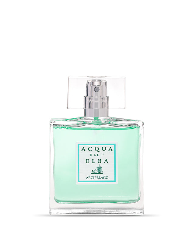 A clear glass bottle of Acqua dell'Elba Arcipelago Uomo - 50ml, a Mediterranean men's perfume by Acqua dell'Elba, with light aqua liquid, a minimalist white label, and transparent rectangular cap, displayed on a white background.