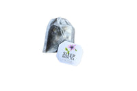 A small mesh bath tea bag, labeled "Bath Tea Single Bag - Sleep" by Hampton Court, is shown with a tag and floral design on a white background, promising relaxation through essential oils.