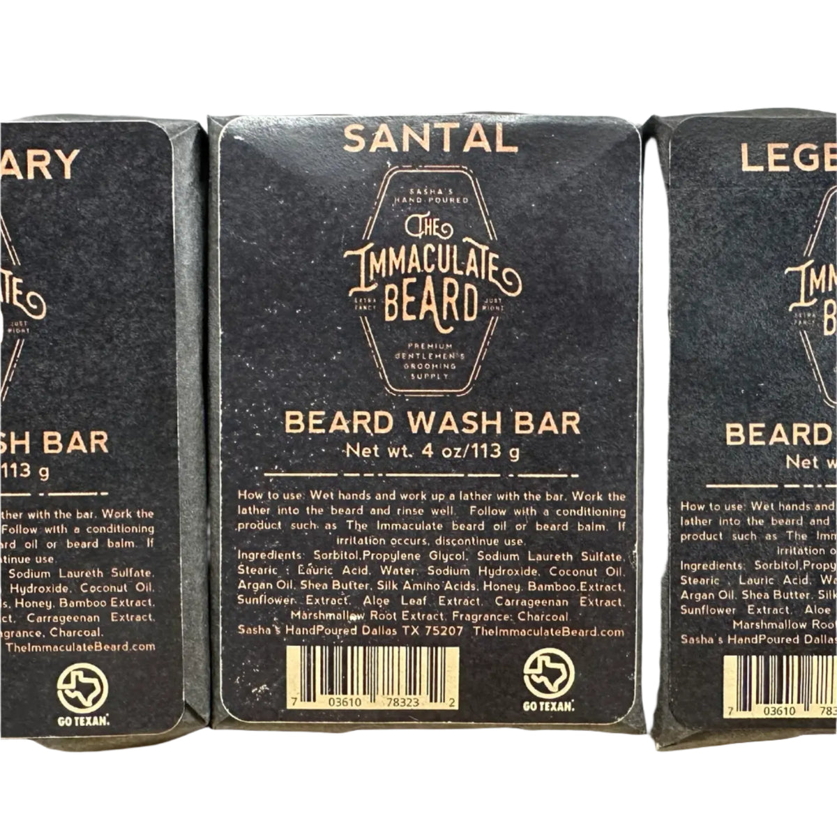 A rectangular 4 oz bar of The Immaculate Beard SANTAL Beard Wash Bar is shown in black packaging with gold and white text detailing its smoked sandalwood scent, ingredients, usage instructions, and brand information.