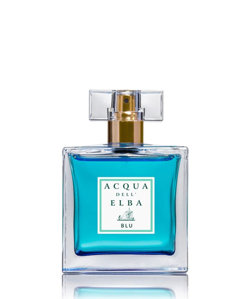 A 50ml bottle of Acqua dell'Elba Blu Donna Eau de Parfum features a clear square cap and a golden spray nozzle. The glass container holds vibrant blue liquid, embodying a floral and woody fragrance, with a white label displaying green text, set against a pristine white background.