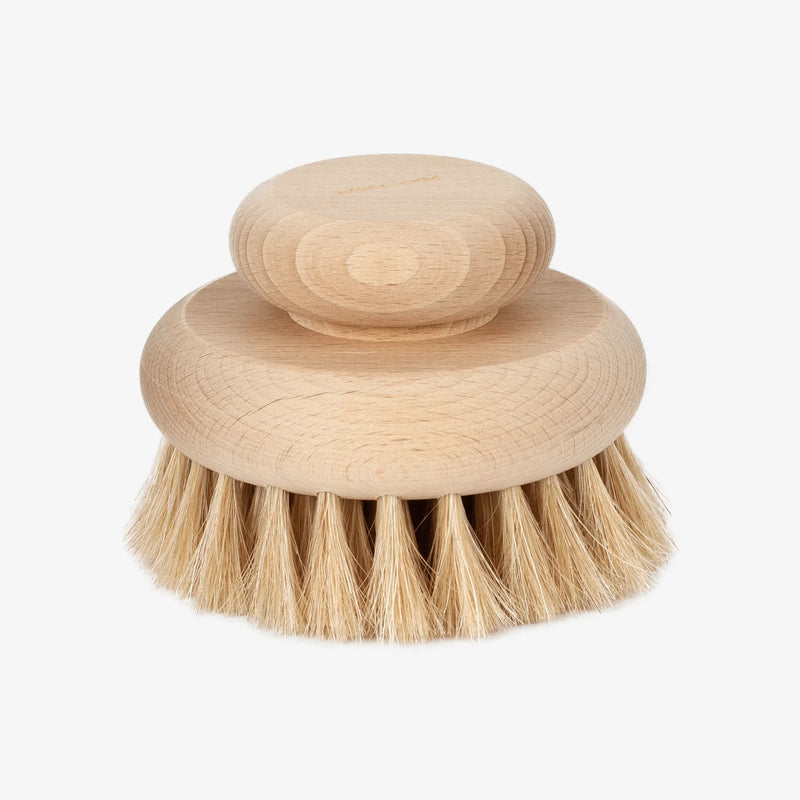 Introducing the Andrée Jardin Beech Wood Large Body Brush, crafted by Hampton Court Essential Luxuries & The Lavender Shop. This round body brush features stiff bristles and a knob-like handle, perfect for cleaning tasks. Its natural wood finish and compact design offer a rustic appearance that makes it ideal for dry brushing to enhance skin stimulation.