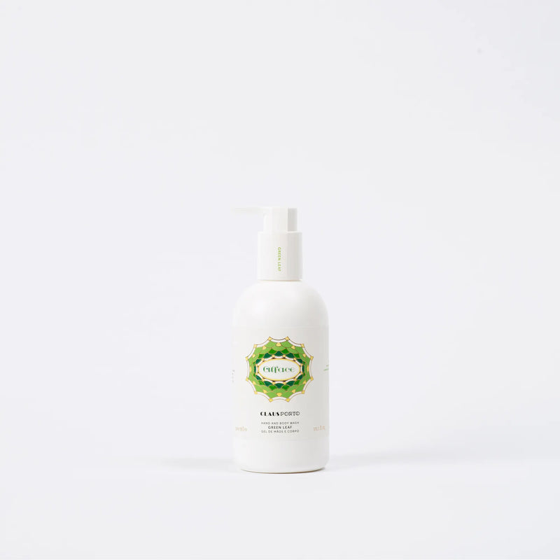 A white lotion pump bottle with a green label featuring decorative text, centered on a plain white background, contains Claus Porto Liquid Soap - Alface hand and body wash by Claus Porto 1887.