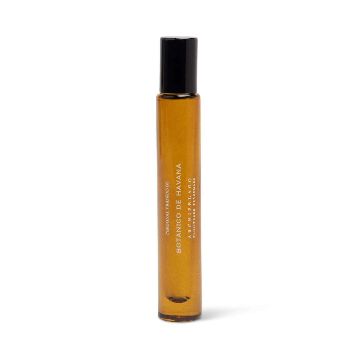 An amber glass rollerball labeled "Archipelago Botanico de Havana" with a black cap stands upright against a white background—a travel-friendly fragrance by Archipelago Botanicals for lovers of Havana scents.
