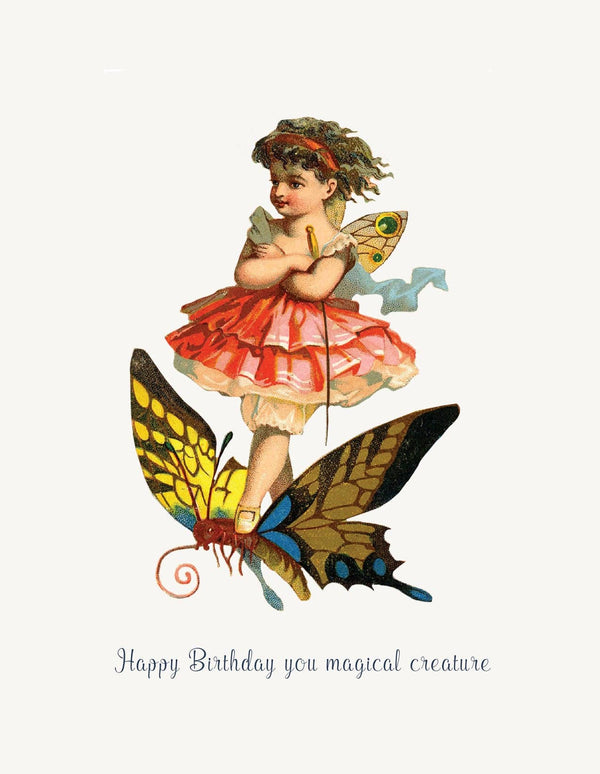 The P. Flynn Design / Phun House "Happy Birthday You Magical Creature" card features a vintage-style girl with wings and a red dress atop a butterfly, with whimsical text—making it an enchanting birthday greeting.