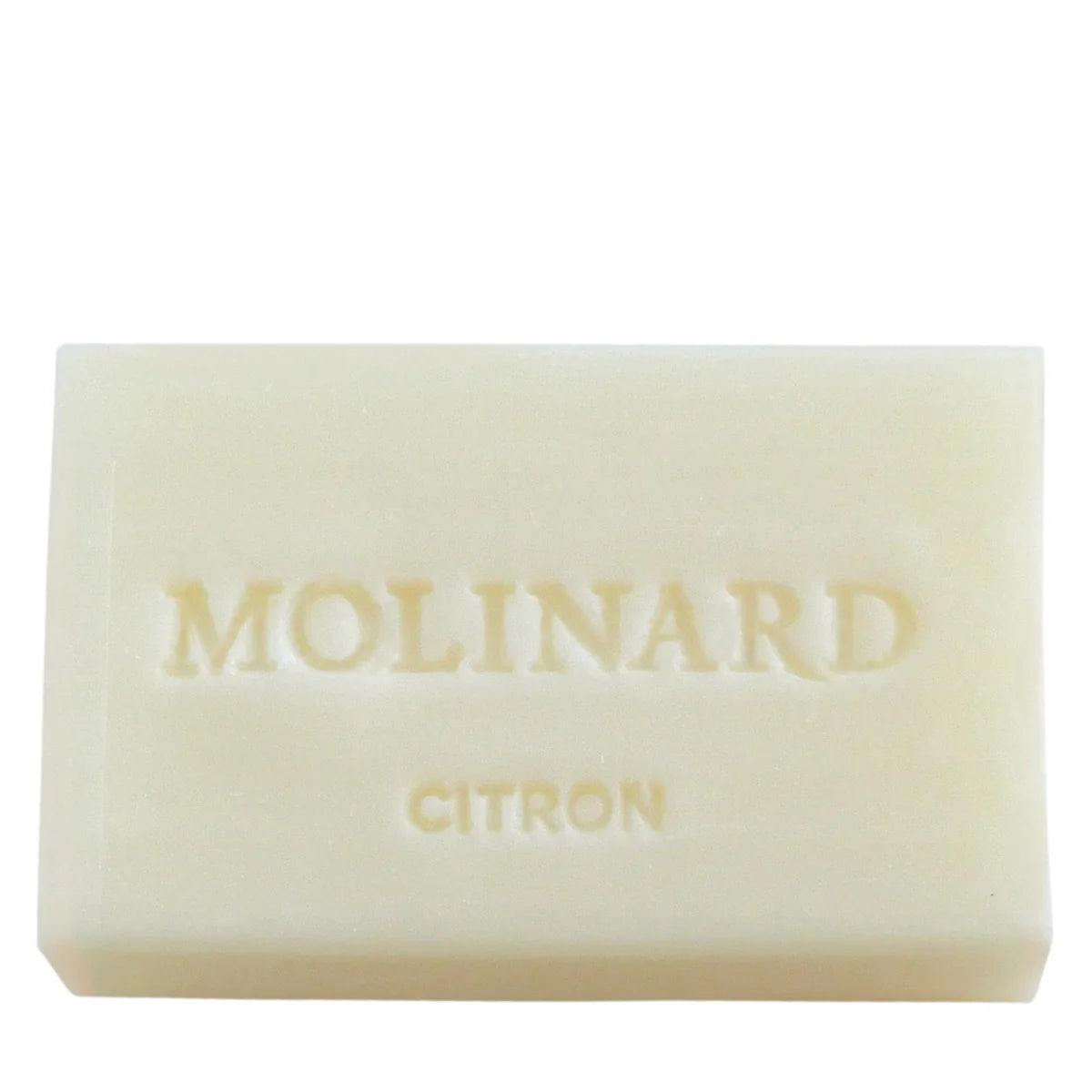 A rectangular, light yellow Molinard Soap - Citron bar with "Molinard" and "Citron" embossed on it sits against a plain white background. This classic French soap is by the brand Molinard.