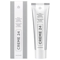 A tube and box of Molinard Creme 24 by Molinard, a soothing face and body balm. Both are white and silver with black text showing the product name vertically and additional details in English and French.