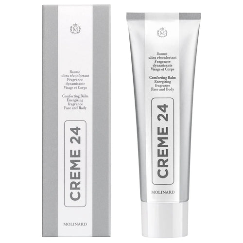 A tube and box of Molinard Creme 24 by Molinard, a soothing face and body balm. Both are white and silver with black text showing the product name vertically and additional details in English and French.