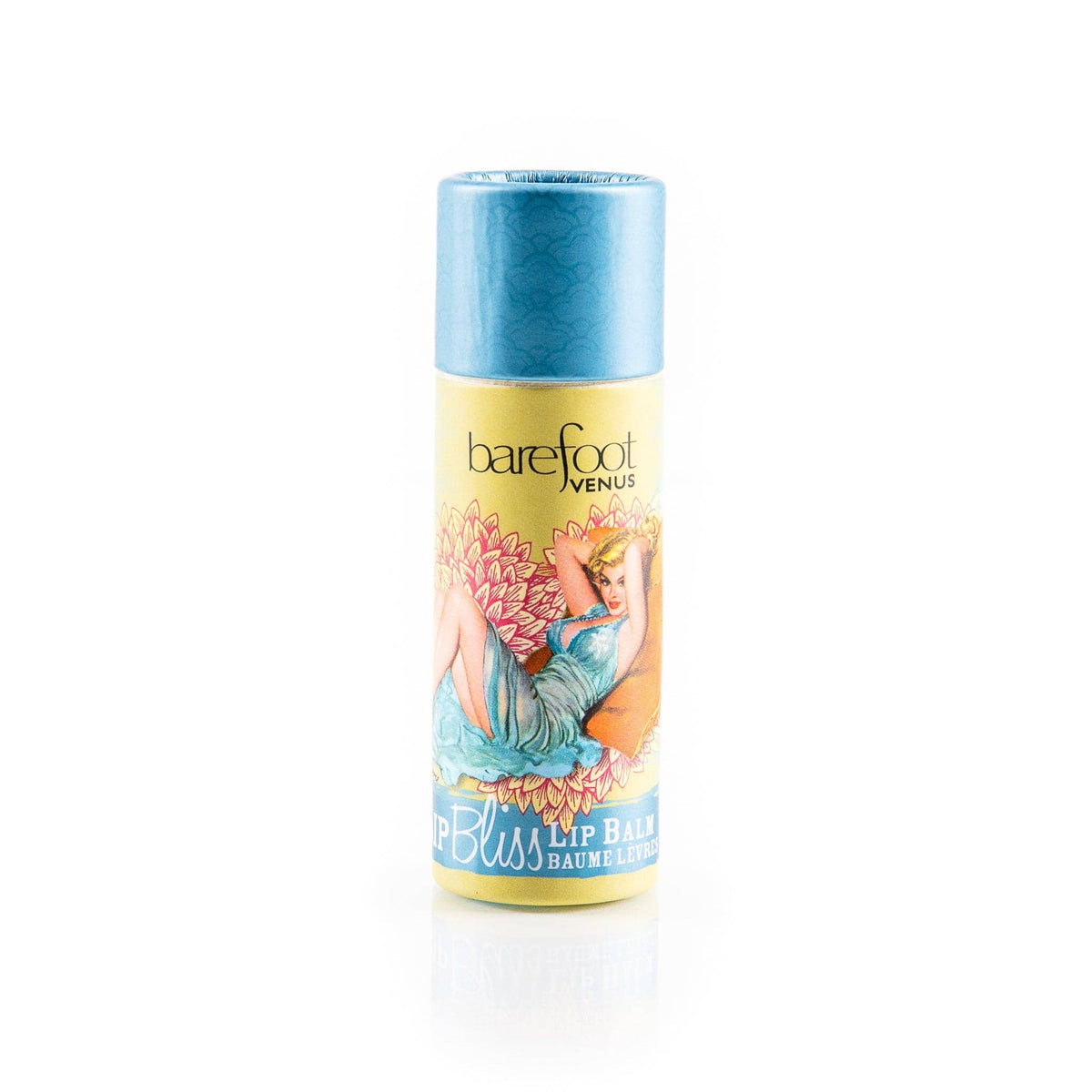 A Barefoot Venus Coconut Kiss Lip Balm tube with a blue cap and a yellow label, featuring an illustration of a woman in a blue dress reclining on a flower. Enriched with nourishing Mango Butter, the text "barefoot venus" and "Lip BLISS Lip Balm Baume Lèvres" is visible on the label.