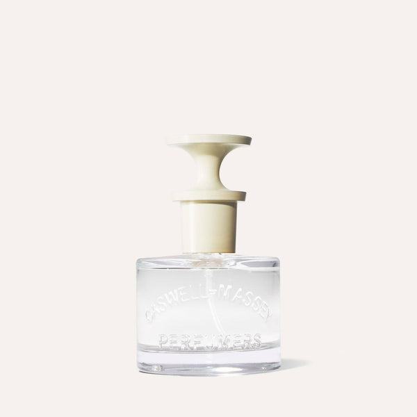 The Caswell-Massey Almond Eau de Toilette 60mL comes in a clear glass bottle with a cream, wide round cap, embossed with "Caswell-Massey Perfumers", and features floral amber gourmand notes.