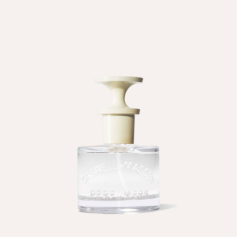 The Caswell-Massey Almond Eau de Toilette 60mL comes in a clear glass bottle with a cream, wide round cap, embossed with "Caswell-Massey Perfumers", and features floral amber gourmand notes.