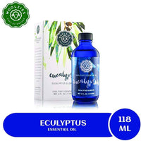 A blue bottle of Woolzies Eucalyptus Essential Oil is shown beside its box with green leaves, featuring the product name and 118 ml size—an excellent natural cleaning agent that also supports respiratory health.