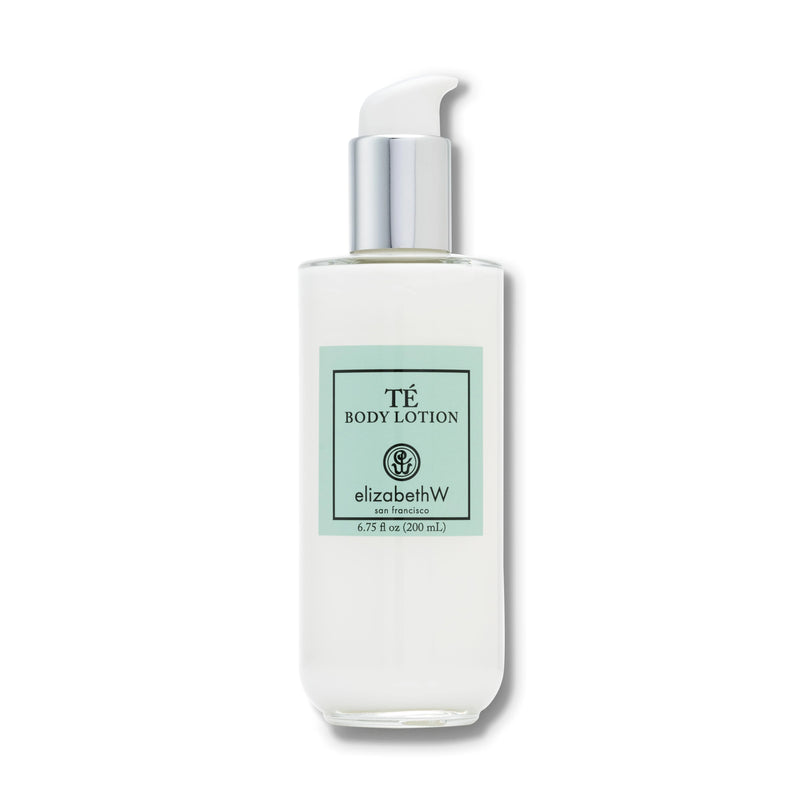 A bottle of Elizabeth W Signature Té Body Lotion with a pump dispenser, isolated on a white background. The label is green with white and black text.