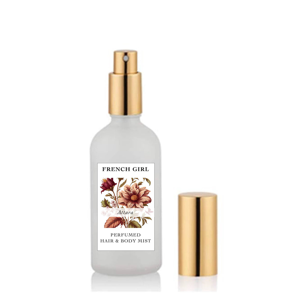 A frosted glass spray bottle with a gold pump and cap sits beside it. The label reads "FRENCH GIRL" with floral artwork and “Perfumed Hair & Body Mist”—an alcohol-free, vegan mist available in 3 scents.