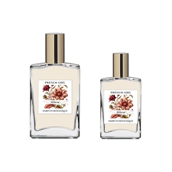 Two glass bottles of FRENCH GIRL Attara Organic Vegan Amber Natural Aromatherapy Perfume, each with a gold cap and large brownish-red flower illustration, are available in different sizes and contain alcohol-free, vegan fragrance.