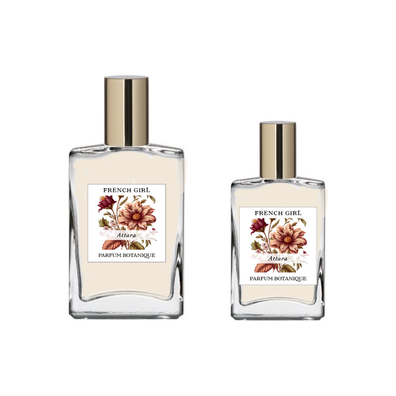 Two glass bottles of FRENCH GIRL Attara Organic Vegan Amber Natural Aromatherapy Perfume, each with a gold cap and large brownish-red flower illustration, are available in different sizes and contain alcohol-free, vegan fragrance.