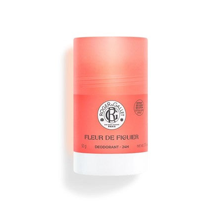 A pink and white cylindrical container of Roger & Gallet Fig Blossom Wellbeing Deodorant, 50g, features a round logo on the front and is labeled as a 24-hour aluminum-free natural deodorant.