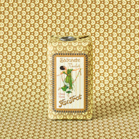 The Claus Porto 1887 Classico Fox Trot Violet Soap, wrapped in gold patterned paper with a dancing woman illustration, offers a classic violet scent and floral fragrance.