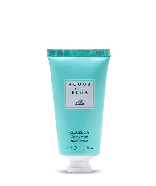 A turquoise tube of Acqua dell'Elba Classica Hand Cream stands upright against a white background. This lightweight 50 ml (1.7 fl oz) hand moisturizer by Acqua dell'Elba hydrates your skin daily and features white labeling with blue accents.