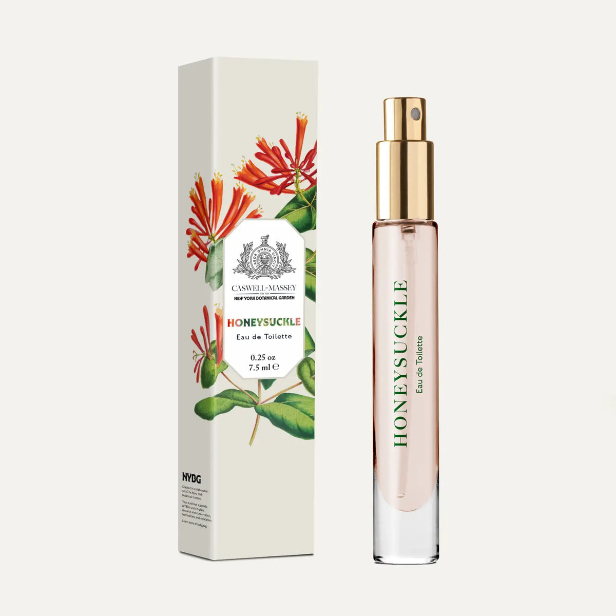 A slim 7ml glass spray bottle of Caswell-Massey Honeysuckle Eau de Toilette stands beside its floral box decorated with orange honeysuckle and green leaves—showcasing this fresh, elegant fragrance from Caswell-Massey.