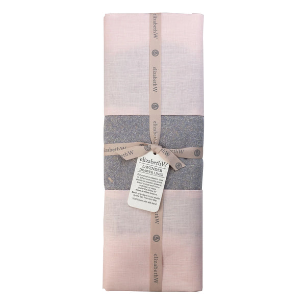 The elizabeth W Lavender Linen Drawer Liner - Pink is folded and wrapped with a beige "elizabethW" ribbon. A clear section displays lavender inside, while a tag describes this handcrafted linen liner as lavender-scented.