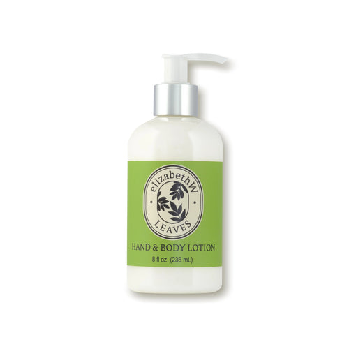 A white pump bottle of elizabeth W Botanist's Scent Lab Leaves Hand & Body Lotion, infused with cedar and sandalwood. The bottle features a green label with the brand logo and black text detailing, "Hand & Body Lotion, 8 fl oz (236 mL)." The cap and pump are white, promising lasting hydration.