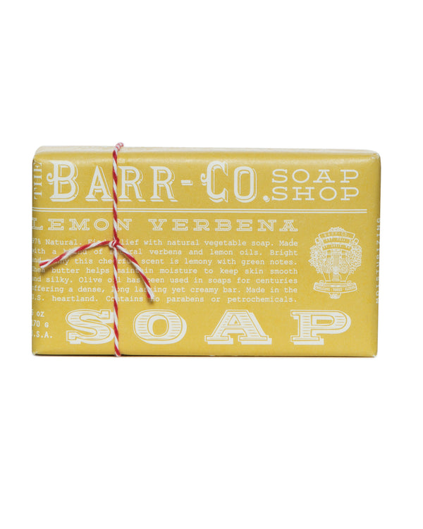 Barr-Co. Lemon Verbena Triple-Milled Bar Soap is wrapped in vintage-inspired paper with white text, tied with a red and white string. It features moisturizing olive oil and natural ingredients.