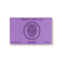 The elizabeth W Botanist's Scent Lab Lilac Bar Soap is a rectangular purple soap that is beautifully embossed with "TRIPLE MILLED SOAP" and "elizabethW LILAC." Weighing 3.5 oz (100 g), it offers a delightful floral fragrance and captures the essence of lilac in its elegant design.