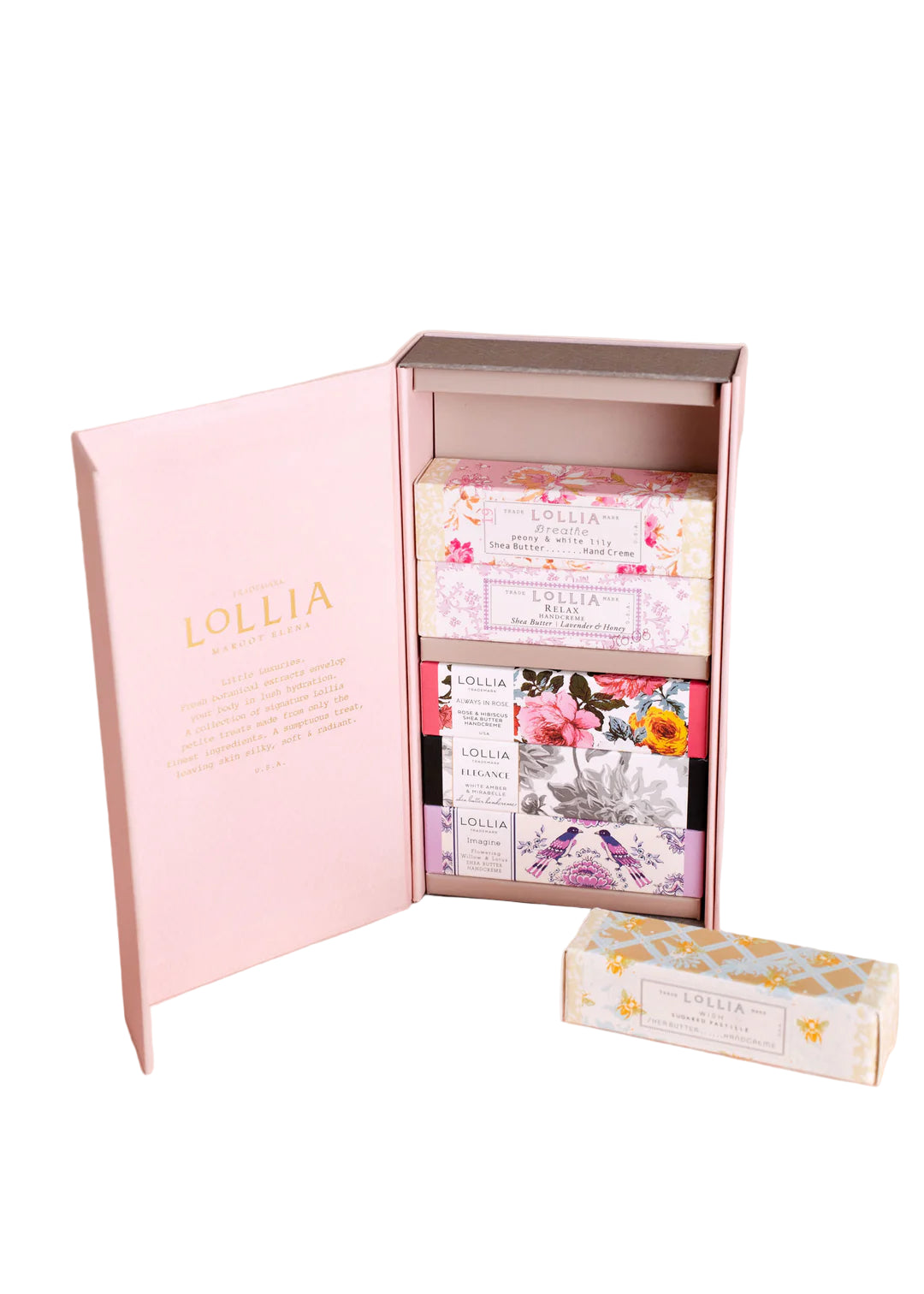 An open pink Lollia box by Margot Elena displays four individually wrapped floral soap bars in purple, pink, yellow, and white—perfect to pair with the Lollia Petite Treat Handcreme Gift Set Asst. 2 for a thoughtful gift.